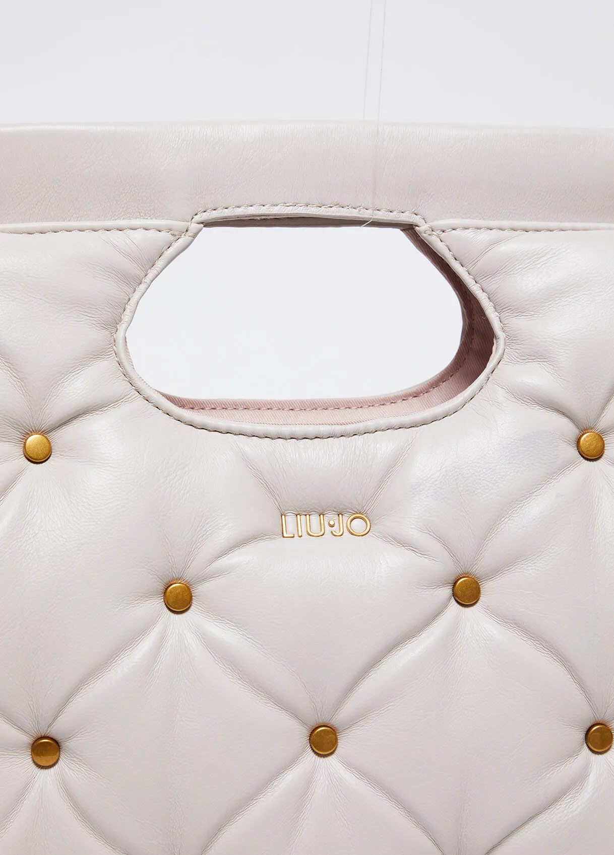 Borsa a mano glossy con borchie