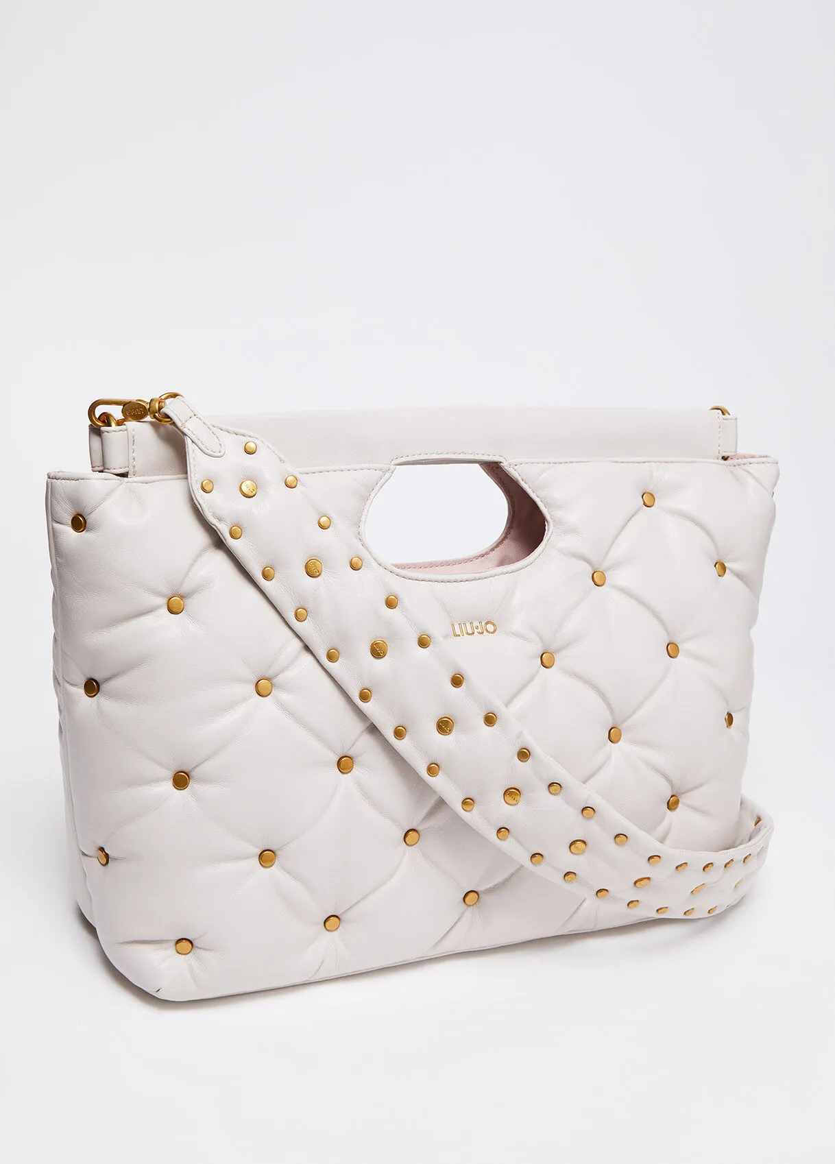 Borsa a mano glossy con borchie