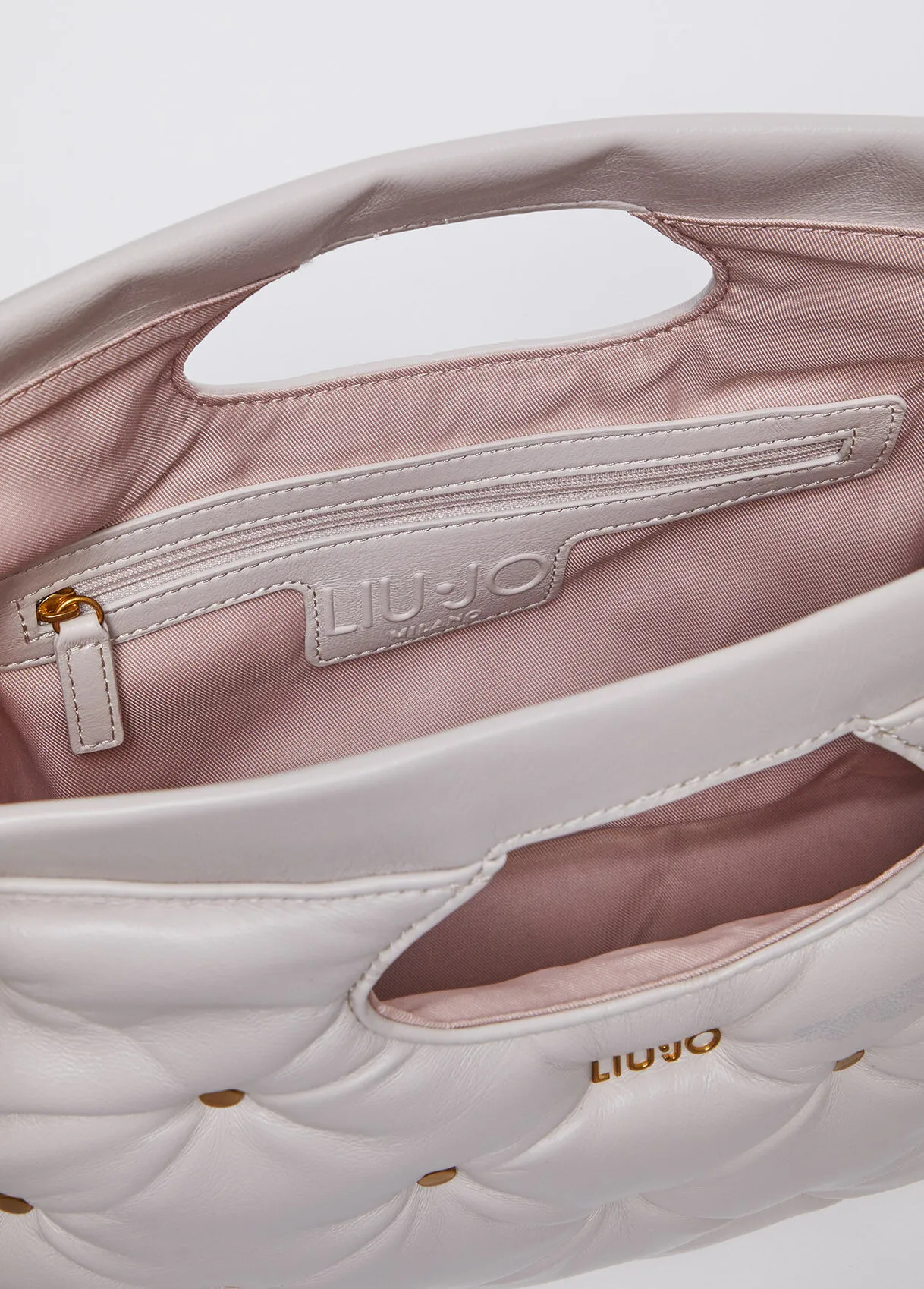 Borsa a mano glossy con borchie