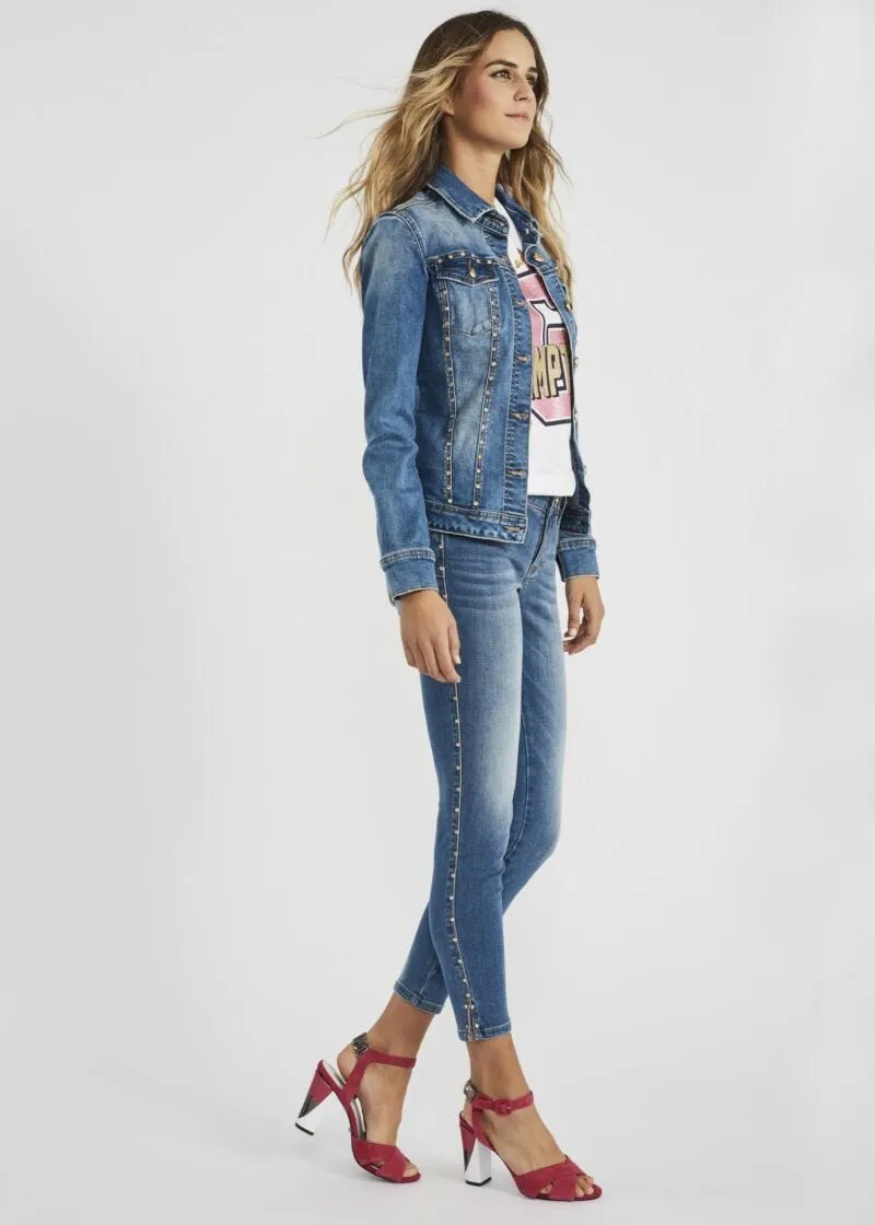 Jeans skinny con rivetti