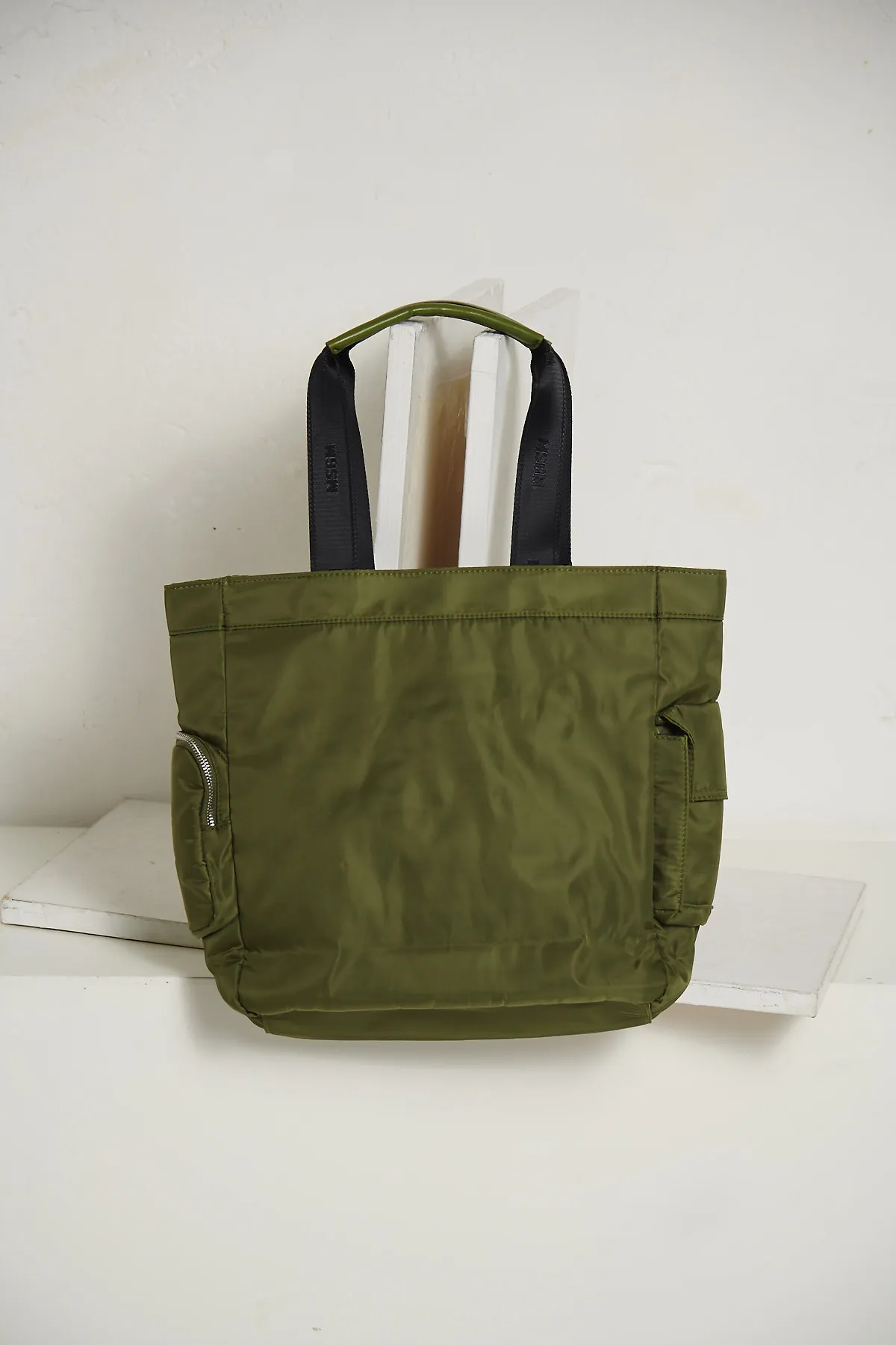 MSGM – Borsa unisex in nylon verde, con tasconi