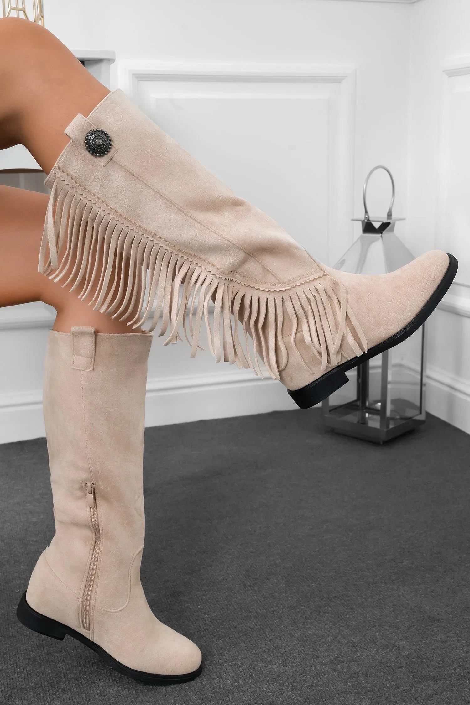 Stivali beige camperos con frange